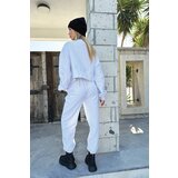 Trend Alaçatı Stili Women's White Double Pocket Elastic Waist And Cuff Jogging Textured Trousers | Shoptok.si