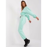 Fashion Hunters Mint and fluoroorange tracksuit with letter A Cene