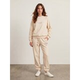 Sinsay Regular jogger fleece hlače s izvezenim natpisom NYC | shoptok.hr
