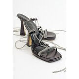LuviShoes Women's Mezzo Metallic Black Heeled Sandals Cene