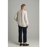 FASHION Beige oversize blouse with a decorative flower | shoptok.hr