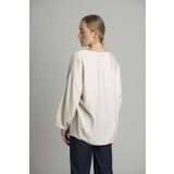 FASHION Beige oversize blouse with a decorative flower | shoptok.hr