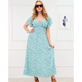 Resti Long green women's dress with floral motif - Clothing | Shoptok.si