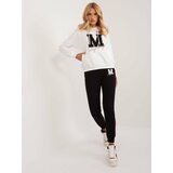 Fashion Hunters Ecru-black tracksuit with patches cene