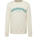 AÉROPOSTALE Sweater majica 'КRACK & FIELD' ecru/prljavo bijela / zelena / smaragdno zelena