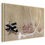  Slika - Banksy\'s Plane (1-part) - Red Graffiti Text on Mural Background 120x80 U prirodnom drvenom okviru | shoptok.hr