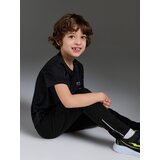 Sinsay Sportske slim hlače s reflektirajućim printom Active | shoptok.hr