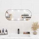 vidaXL Stensko ogledalo z LED lučkami 30x70 cm stekleno ovalno