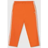 Adidas Spodnji del trenirke oranžna barva, IR9894