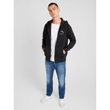 Tommy Hilfiger Jopa na zadrgo črna / bela | Shoptok.si