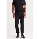 ALTINYILDIZ CLASSICS Men's Black Standard Fit Regular Fit Cotton Sweatpants Cene