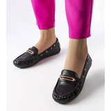 Gemre Black moccasins decorated with a Seattle appliqué Cene