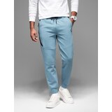 Ombre Men's sweatpants with ribbed cuffs and decorative zipper - light blue | Shoptok.si