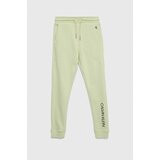 Calvin Klein Jeans Otroška bombažna trenirka zelena barva | Shoptok.si