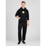 Huf Majica svetlo zelena / črna | Shoptok.si