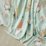 Catherine Lansfield Svetlo zelena odeja z velikonočnim motivom iz mikropliša 130x170 cm Spring Gonks – | Shoptok.si