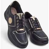 Resti Women's Sneakers on a Low Wedge Carese | Shoptok.si