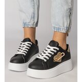 Gemre Black sneakers with a heart pierced by a pin Lerisol | Shoptok.si