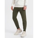 Ombre Men's sweatpants with stitching and leg zipper - olive Cene