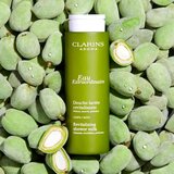 Clarins Eau Extraordinaire Revitalizing Shower Milk losjon za prhanje proti izsuševanju kože 200 ml | Shoptok.si