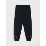 Sinsay Sportske hlače relaxed fit s kontrastnim paspulom Active | shoptok.hr
