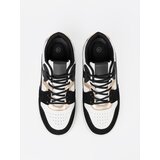 Shelvt Black and white sneakers with gold details | ePonuda.com