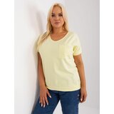 Fashion Hunters Light yellow women's plus size blouse with pocket Cene