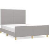  Posteljni okvir z vzglavjem svetlo siv 140x190 cm blago, (20903578) | Shoptok.si
