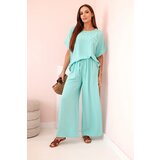 Kesi Włoski Women's viscose set with decorative flower and wide trousers - mint | Shoptok.si