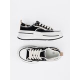 Shelvt Black women's sneakers with white inserts | shoptok.hr