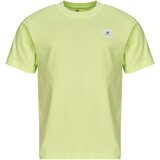 New Balance Majice s kratkimi rokavi WOVEN LABEL T-SHIRT Rumena Cene