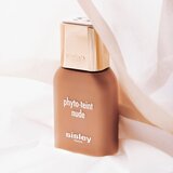 Sisley Phyto-Teint Nude posvetlitveni in vlažilni tekoči puder za naraven videz odtenek 000N Snow 30 ml | Shoptok.si