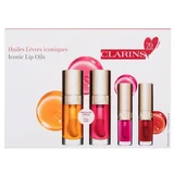 Clarins Lip Comfort Oil set: olje za ustnice Lip Comfort Oil 7 ml 01 Honey + olje za ustnice Lip Comfort Oil 7 ml 04 Pitaya + olje za ustnice Lip Comfort Oil 1,4 ml 02 Raspberry + olje za ustnice Lip Comfort Oil 1,4 ml 08 Strawberry