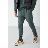 GRIMELANGE Sweatpants - Green - Joggers Cene
