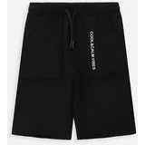 Coccodrillo Otroške bombažne kratke hlače črna barva