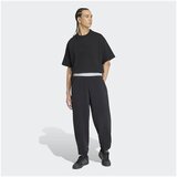 Adidas Spodnji deli trenirke KS5568 Črna Cene