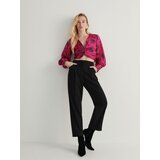 Reserved bluza z okrasnim vozlom - roza Cene
