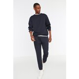 Trendyol Navy Blue Knitted Pajamas with Stripes. Cene