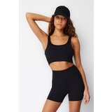Trendyol Black Brushed Soft Fabric Supported/Shaping Printed Knitted Sports Bra Cene