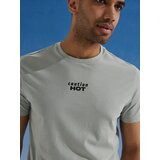 Sinsay Pamučna majica s natpisom Caution Hot | shoptok.hr