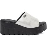 GOODIN Silver flip-flops on a black platform Cene