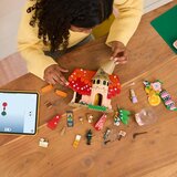 Lego LEGO® Wicked - Glinda in Elphaba obiščeta Munchkinland (75690) | Shoptok.si