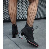 Gemre Black ankle boots with a red accent on the heel San Cene