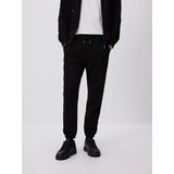 Reserved Regular fit donji dio trenirke - crno | shoptok.hr