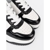 Shelvt Black and white sneakers with shimmering silver details | ePonuda.com