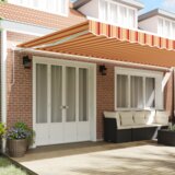 vidaXL ručno uvlačna tenda Narančasta i žuta 600x300 cm | shoptok.hr