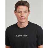 Calvin Klein Jeans Majice s kratkimi rokavi SS STANDARD LOGO 30S CREWNK TEE Črna | Shoptok.si