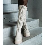 Gemre Beige eco leather flat heel boots decorated with a zipper Hala | Shoptok.si