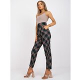 Fashion Hunters Black and green elegant trousers made of checked material Cene