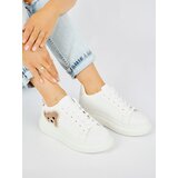 Shelvt White women's sports shoes with a teddy bear Cene